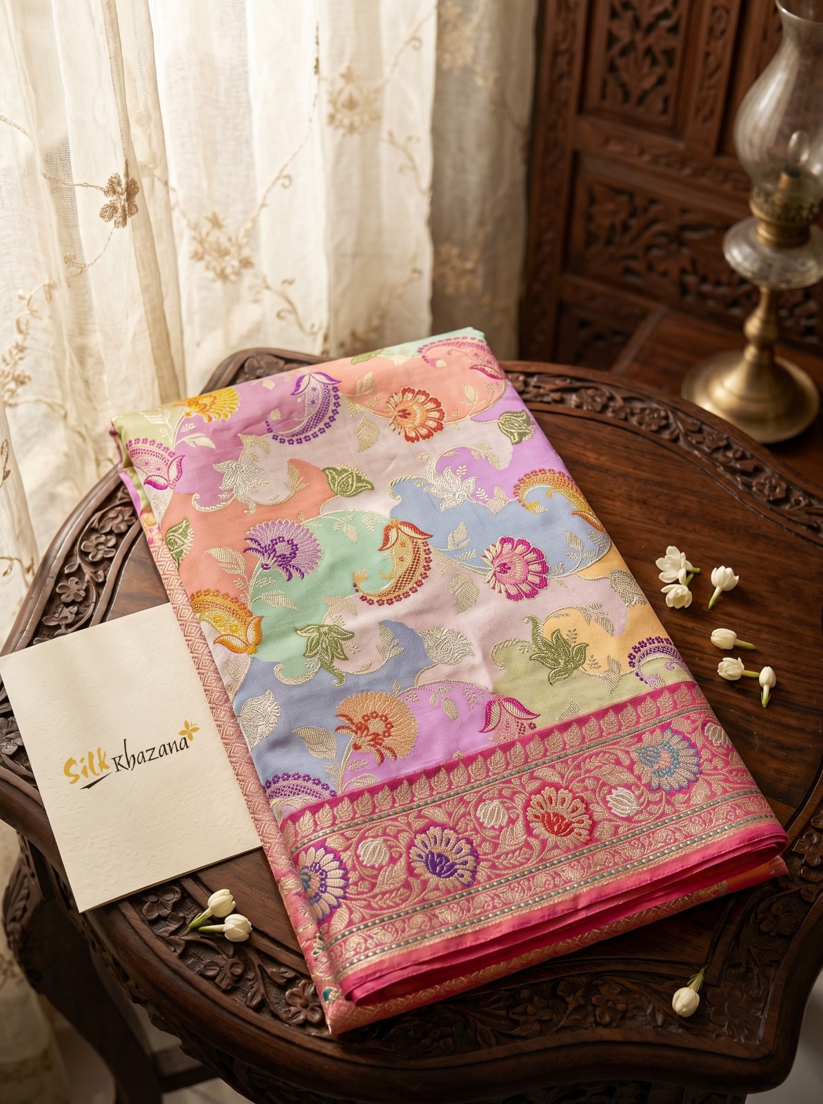 Elegant folded Banarasi Moonga Silk Saree from Silk Khazana showcasing its exquisite motifs